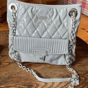 Coach Quilted Patent Shoulder Bag in Light Gray with Silver Chain retails $298
